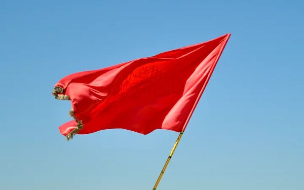 Photo of a flying red flag