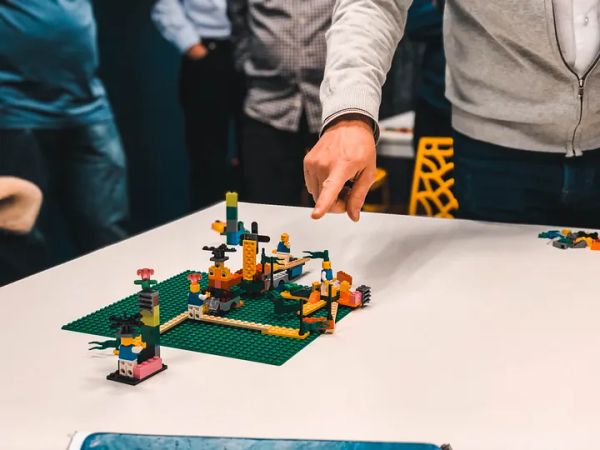 Lego bricks and minifigures used to illustrate how a scenario works